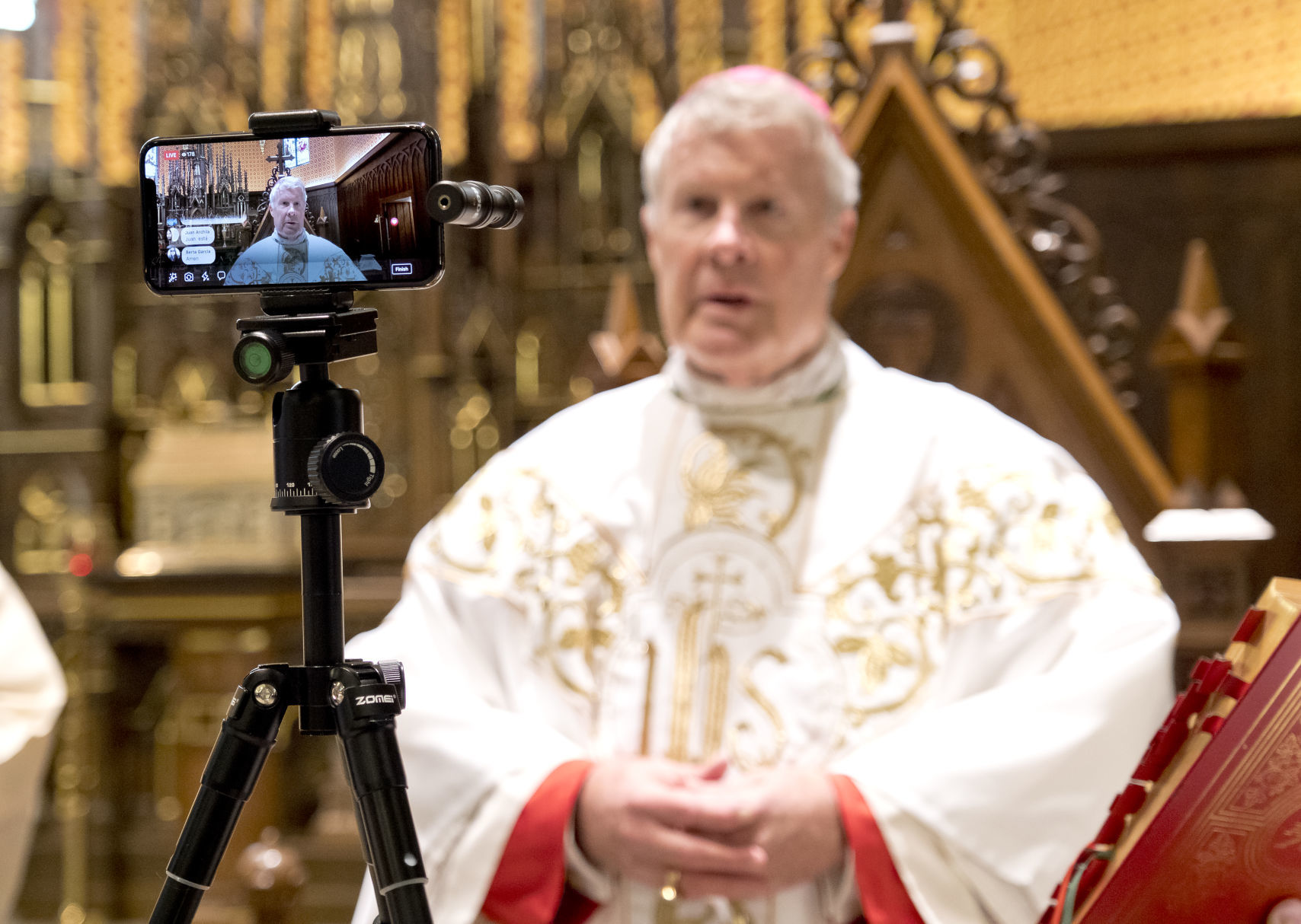 COVID-19 Catholic mass is live streamed on Holy Thursday